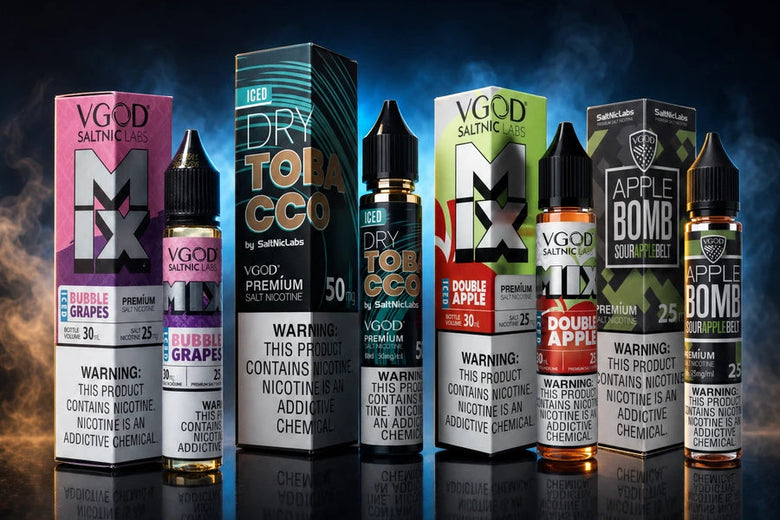 Six VGod Nic Salts e-liquid bottles and boxes arranged in a row on a dark reflective studio background. The products include Grape, Magnum, Top Co, Apple, and Apple Bomb flavors, with prominent VGod branding and flavor labels visible on the packaging.